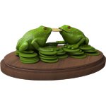 Two frogs with a coin in the middle